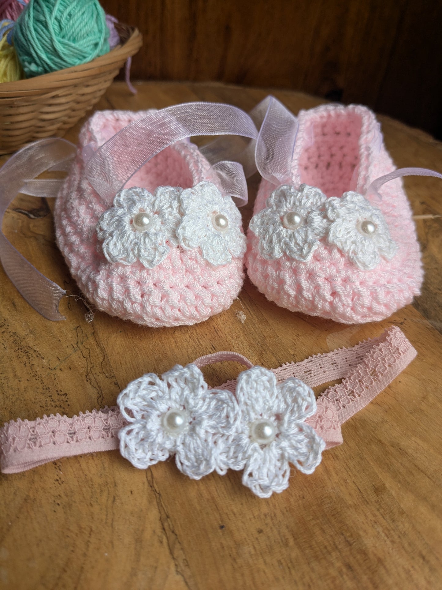 Pink Baby booties with white flowers