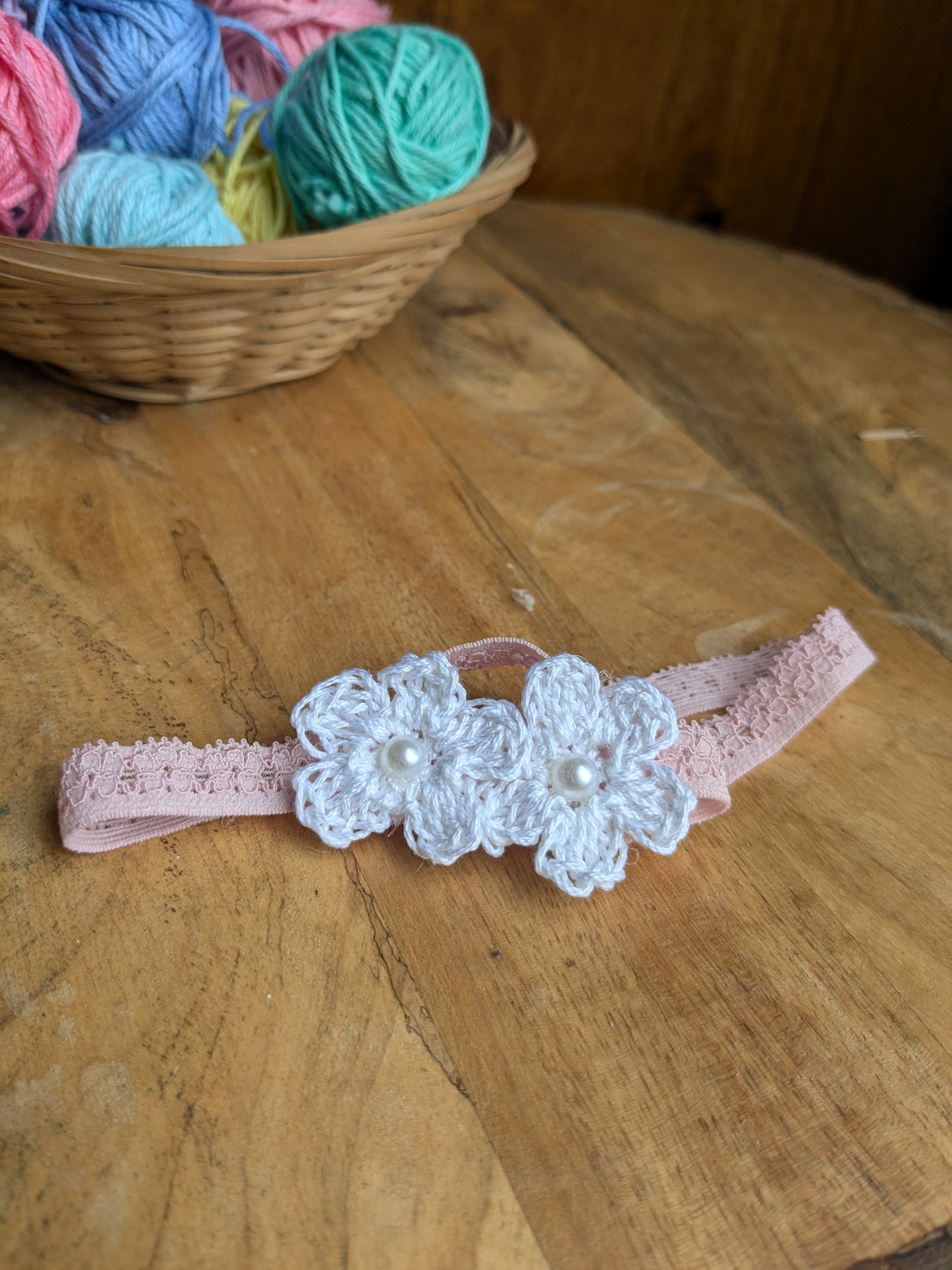 Pink Baby booties with white flowers
