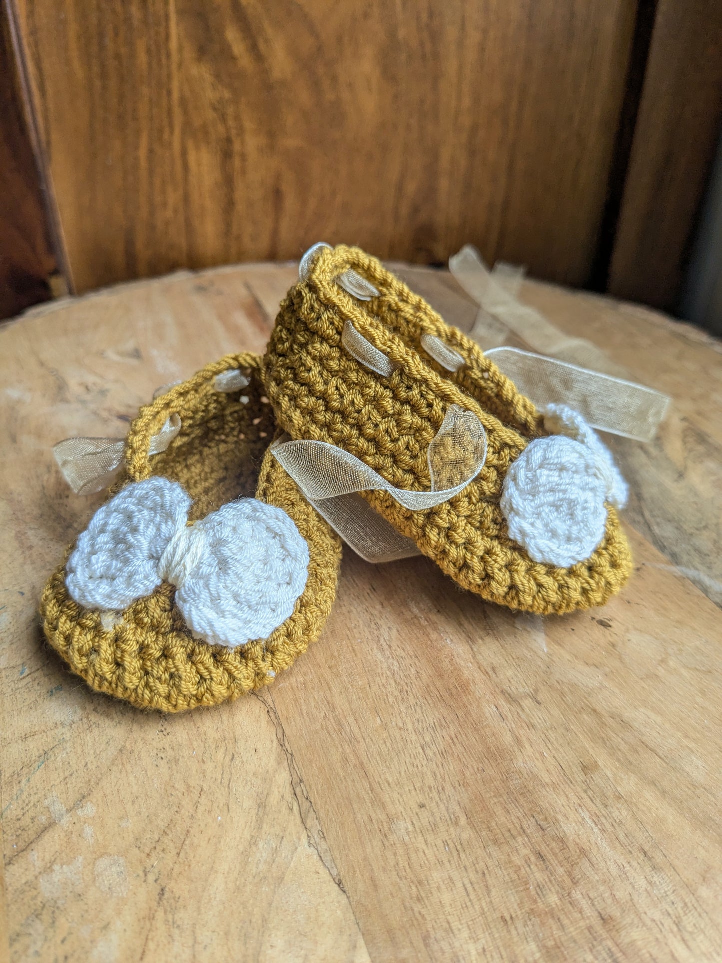 Mustard Crochet Baby booties with bow