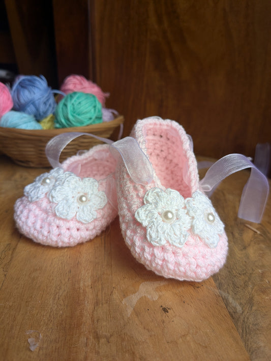 Pink Baby booties with white flowers