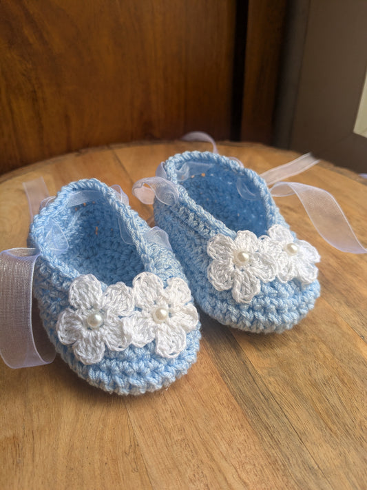 Blue Baby booties with white flowers